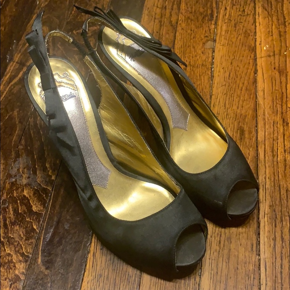 Sheer satiny black 5” heels with bow accent